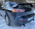 Черный Мицубиси Lancer Ralliart, объемом двигателя 2 л и пробегом 149 тыс. км за 10600 $, фото 81 на Automoto.ua