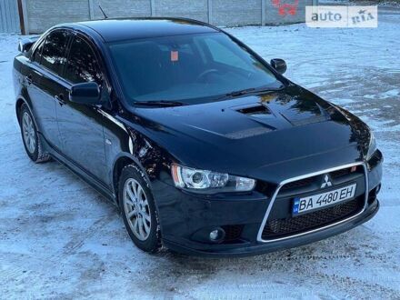 Черный Мицубиси Lancer Ralliart, объемом двигателя 2 л и пробегом 149 тыс. км за 10600 $, фото 1 на Automoto.ua