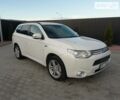 Белый Мицубиси Outlander PHEV, объемом двигателя 2 л и пробегом 184 тыс. км за 18790 $, фото 1 на Automoto.ua