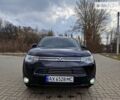 Чорний Міцубісі Outlander PHEV, об'ємом двигуна 2 л та пробігом 248 тис. км за 17700 $, фото 1 на Automoto.ua