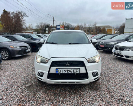 Белый Мицубиси Outlander Sport, объемом двигателя 2 л и пробегом 177 тыс. км за 10300 $, фото 1 на Automoto.ua