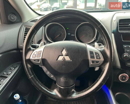 Белый Мицубиси Outlander Sport, объемом двигателя 2 л и пробегом 177 тыс. км за 10300 $, фото 9 на Automoto.ua