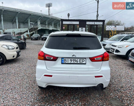 Белый Мицубиси Outlander Sport, объемом двигателя 2 л и пробегом 177 тыс. км за 10300 $, фото 5 на Automoto.ua