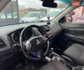 Белый Мицубиси Outlander Sport, объемом двигателя 2 л и пробегом 177 тыс. км за 10300 $, фото 11 на Automoto.ua