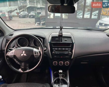 Белый Мицубиси Outlander Sport, объемом двигателя 2 л и пробегом 177 тыс. км за 10300 $, фото 8 на Automoto.ua