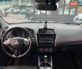 Белый Мицубиси Outlander Sport, объемом двигателя 2 л и пробегом 177 тыс. км за 10300 $, фото 8 на Automoto.ua