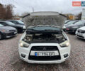 Белый Мицубиси Outlander Sport, объемом двигателя 2 л и пробегом 177 тыс. км за 10300 $, фото 16 на Automoto.ua