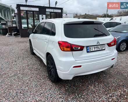 Белый Мицубиси Outlander Sport, объемом двигателя 2 л и пробегом 177 тыс. км за 10300 $, фото 4 на Automoto.ua