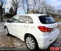 Белый Мицубиси Outlander Sport, объемом двигателя 2 л и пробегом 201 тыс. км за 11700 $, фото 6 на Automoto.ua