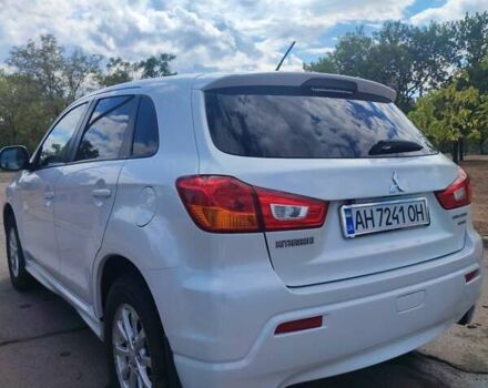 Белый Мицубиси Outlander Sport, объемом двигателя 2 л и пробегом 140 тыс. км за 11000 $, фото 5 на Automoto.ua