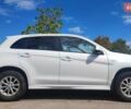 Белый Мицубиси Outlander Sport, объемом двигателя 2 л и пробегом 140 тыс. км за 11000 $, фото 3 на Automoto.ua