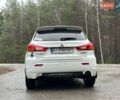 Белый Мицубиси Outlander Sport, объемом двигателя 2 л и пробегом 260 тыс. км за 8999 $, фото 5 на Automoto.ua