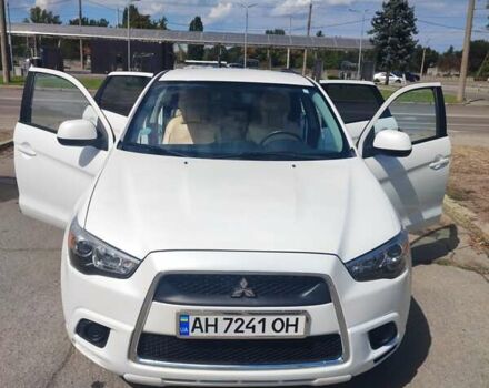 Белый Мицубиси Outlander Sport, объемом двигателя 2 л и пробегом 140 тыс. км за 11000 $, фото 1 на Automoto.ua