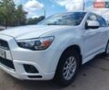Белый Мицубиси Outlander Sport, объемом двигателя 2 л и пробегом 140 тыс. км за 11000 $, фото 1 на Automoto.ua