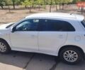 Белый Мицубиси Outlander Sport, объемом двигателя 2 л и пробегом 140 тыс. км за 11000 $, фото 2 на Automoto.ua