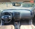 Белый Мицубиси Outlander Sport, объемом двигателя 2 л и пробегом 140 тыс. км за 11000 $, фото 9 на Automoto.ua