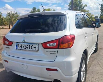 Белый Мицубиси Outlander Sport, объемом двигателя 2 л и пробегом 140 тыс. км за 11000 $, фото 4 на Automoto.ua