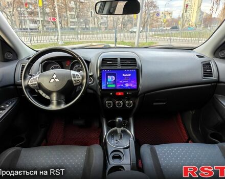 Білий Міцубісі Outlander Sport, об'ємом двигуна 2 л та пробігом 240 тис. км за 8799 $, фото 11 на Automoto.ua