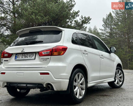Белый Мицубиси Outlander Sport, объемом двигателя 2 л и пробегом 260 тыс. км за 8999 $, фото 6 на Automoto.ua