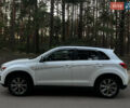 Белый Мицубиси Outlander Sport, объемом двигателя 2 л и пробегом 170 тыс. км за 11000 $, фото 3 на Automoto.ua