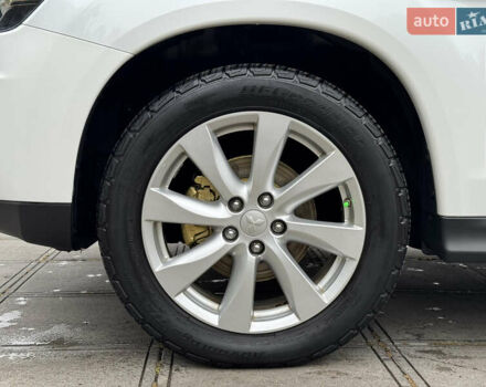 Белый Мицубиси Outlander Sport, объемом двигателя 2 л и пробегом 160 тыс. км за 10800 $, фото 7 на Automoto.ua