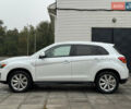 Белый Мицубиси Outlander Sport, объемом двигателя 2 л и пробегом 160 тыс. км за 10800 $, фото 1 на Automoto.ua