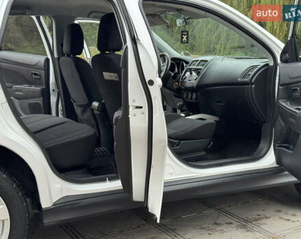 Белый Мицубиси Outlander Sport, объемом двигателя 2 л и пробегом 160 тыс. км за 10800 $, фото 13 на Automoto.ua