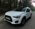 Белый Мицубиси Outlander Sport, объемом двигателя 2 л и пробегом 170 тыс. км за 11000 $, фото 1 на Automoto.ua