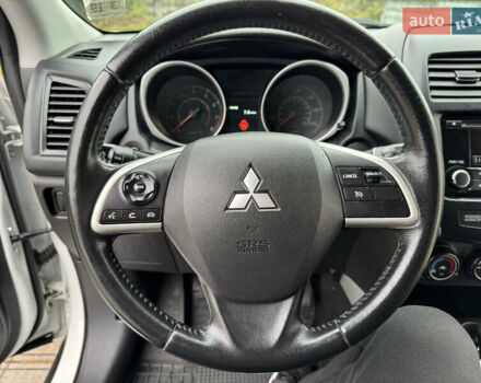 Белый Мицубиси Outlander Sport, объемом двигателя 2 л и пробегом 160 тыс. км за 10800 $, фото 24 на Automoto.ua