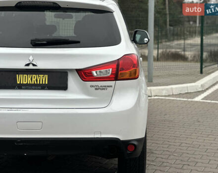 Белый Мицубиси Outlander Sport, объемом двигателя 2 л и пробегом 257 тыс. км за 10800 $, фото 13 на Automoto.ua