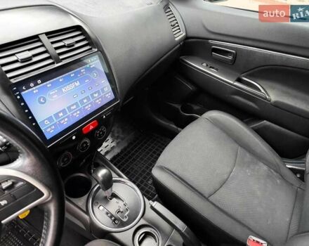 Белый Мицубиси Outlander Sport, объемом двигателя 2.4 л и пробегом 207 тыс. км за 9990 $, фото 53 на Automoto.ua