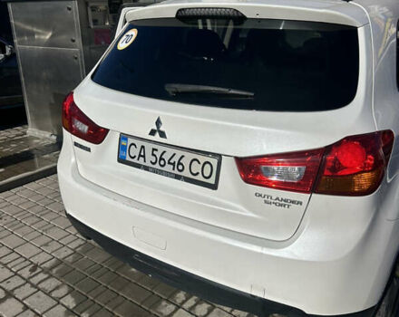 Белый Мицубиси Outlander Sport, объемом двигателя 2 л и пробегом 255 тыс. км за 12000 $, фото 10 на Automoto.ua