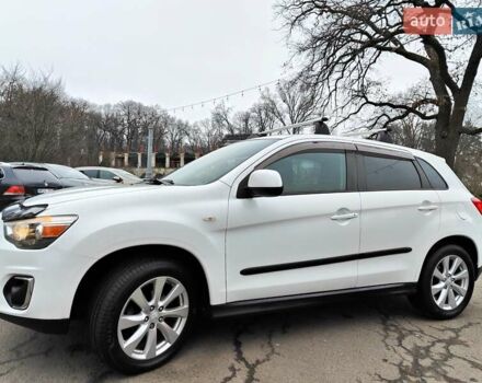 Белый Мицубиси Outlander Sport, объемом двигателя 2.4 л и пробегом 207 тыс. км за 9990 $, фото 2 на Automoto.ua