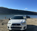 Белый Мицубиси Outlander Sport, объемом двигателя 2 л и пробегом 255 тыс. км за 12000 $, фото 1 на Automoto.ua