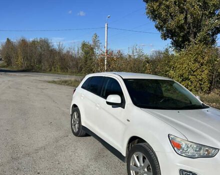 Белый Мицубиси Outlander Sport, объемом двигателя 2 л и пробегом 255 тыс. км за 12000 $, фото 8 на Automoto.ua