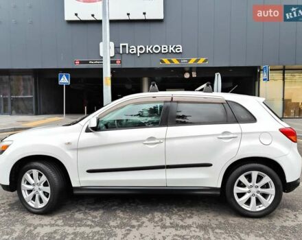 Белый Мицубиси Outlander Sport, объемом двигателя 2.4 л и пробегом 207 тыс. км за 9990 $, фото 12 на Automoto.ua