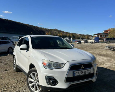Белый Мицубиси Outlander Sport, объемом двигателя 2 л и пробегом 255 тыс. км за 12000 $, фото 1 на Automoto.ua