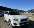 Белый Мицубиси Outlander Sport, объемом двигателя 2 л и пробегом 255 тыс. км за 12000 $, фото 1 на Automoto.ua