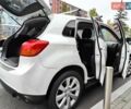Белый Мицубиси Outlander Sport, объемом двигателя 2.4 л и пробегом 207 тыс. км за 9990 $, фото 21 на Automoto.ua