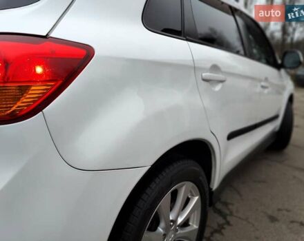 Белый Мицубиси Outlander Sport, объемом двигателя 2.4 л и пробегом 207 тыс. км за 9990 $, фото 15 на Automoto.ua