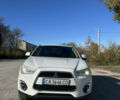 Белый Мицубиси Outlander Sport, объемом двигателя 2 л и пробегом 255 тыс. км за 12000 $, фото 4 на Automoto.ua