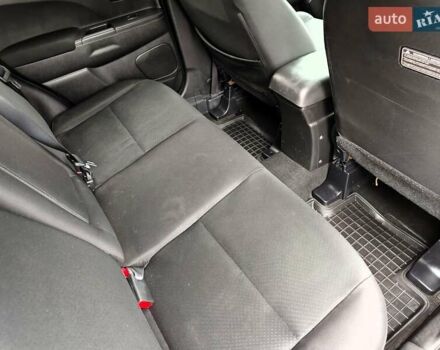 Белый Мицубиси Outlander Sport, объемом двигателя 2.4 л и пробегом 207 тыс. км за 9990 $, фото 53 на Automoto.ua