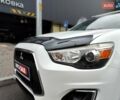 Белый Мицубиси Outlander Sport, объемом двигателя 2.4 л и пробегом 207 тыс. км за 9990 $, фото 1 на Automoto.ua