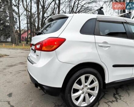 Белый Мицубиси Outlander Sport, объемом двигателя 2.4 л и пробегом 207 тыс. км за 9990 $, фото 16 на Automoto.ua