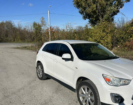 Белый Мицубиси Outlander Sport, объемом двигателя 2 л и пробегом 255 тыс. км за 12000 $, фото 7 на Automoto.ua