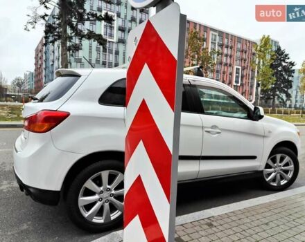 Белый Мицубиси Outlander Sport, объемом двигателя 2.4 л и пробегом 207 тыс. км за 9990 $, фото 23 на Automoto.ua