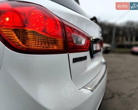 Белый Мицубиси Outlander Sport, объемом двигателя 2.4 л и пробегом 207 тыс. км за 9990 $, фото 12 на Automoto.ua