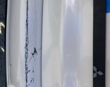 Белый Мицубиси Outlander Sport, объемом двигателя 2 л и пробегом 255 тыс. км за 12000 $, фото 22 на Automoto.ua