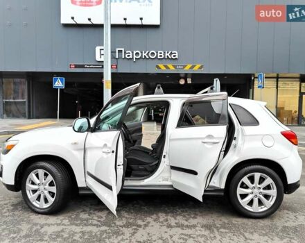 Белый Мицубиси Outlander Sport, объемом двигателя 2.4 л и пробегом 207 тыс. км за 9990 $, фото 10 на Automoto.ua