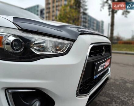Белый Мицубиси Outlander Sport, объемом двигателя 2.4 л и пробегом 207 тыс. км за 9990 $, фото 33 на Automoto.ua